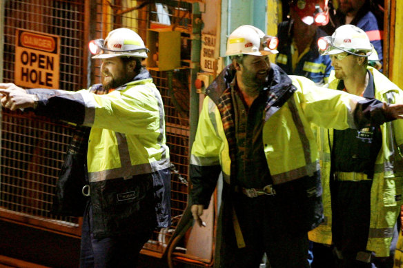 Todd Russell (left) and Brant Webb emerge from the Beaconsfield mine after their rescue.