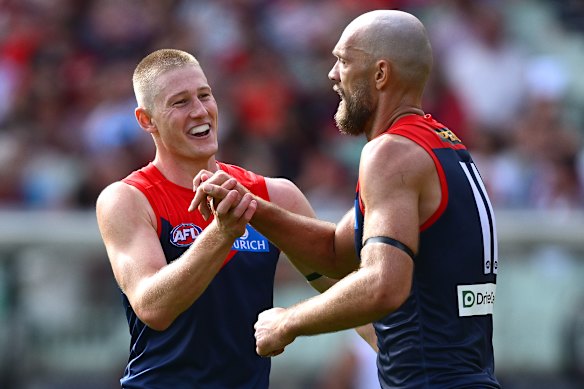 Spring in their step: Jacob van Rooyen and Max Gawn.