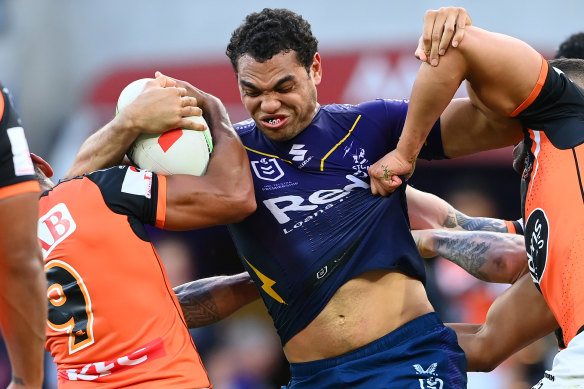 Bursting through: Melbourne Storm’s Xavier Coates.