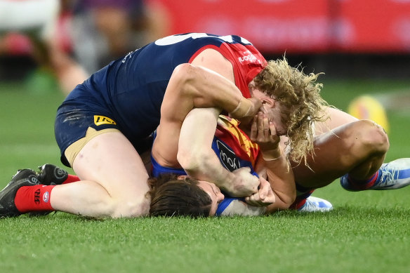 Clayton Oliver and Jarrod Berry clash at the MCG.