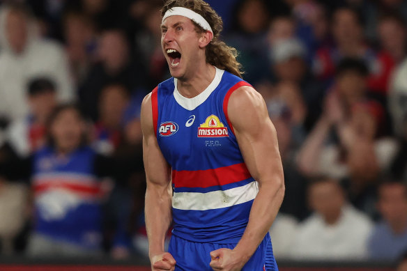 Aaron Naughton has signed an eight-year deal keeping him at the Western Bulldogs until 2032.
