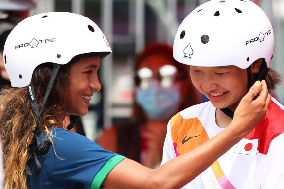 Rayssa Leal of Brazil, 13, greets Momiji Nishiya. also 13, during the women’s street skateboard final in Tokyo.