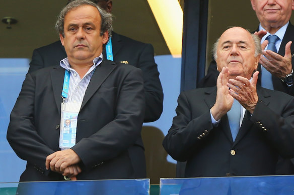 Former UEFA president Michel Platini (left) and former FIFA president Sepp Blatter (right), pictured in 2014.