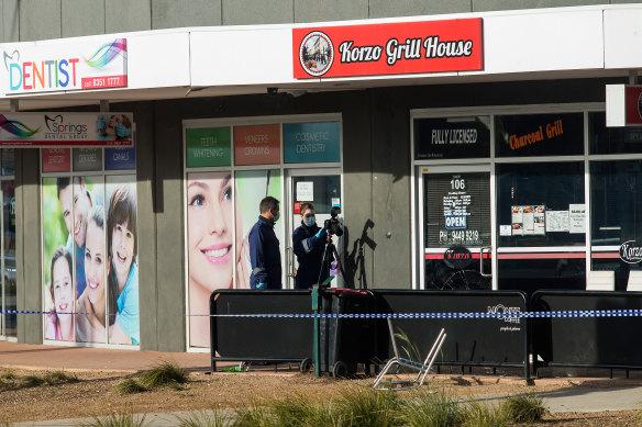Police at the Korzo Grill on the day after the fatal stabbing.