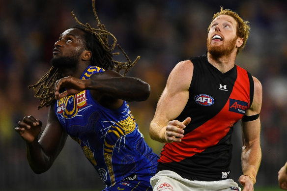 Andrew Phillips (right) battles West Coast’s Nic Naitanui earlier this season.