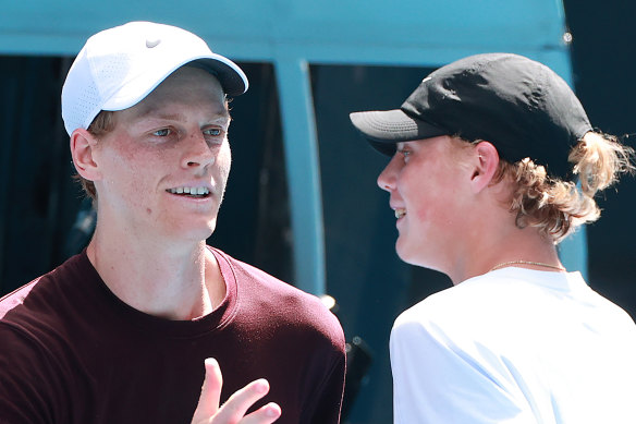 World No.1 Jannik Sinner with a teenage Cruz Hewitt.