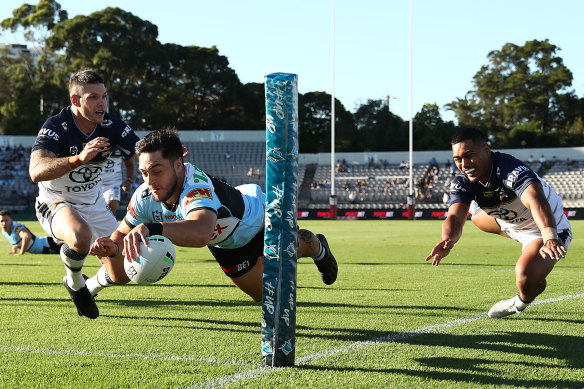 Mawene Hiroti of the Sharks scores a try during the round four match against North Queensland.
