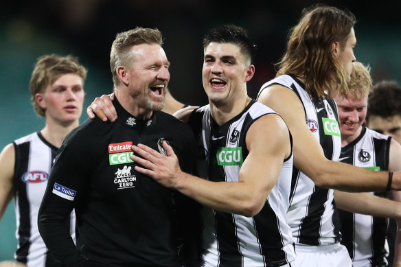 Last laugh: Nathan Buckley after the victory over Melbourne.