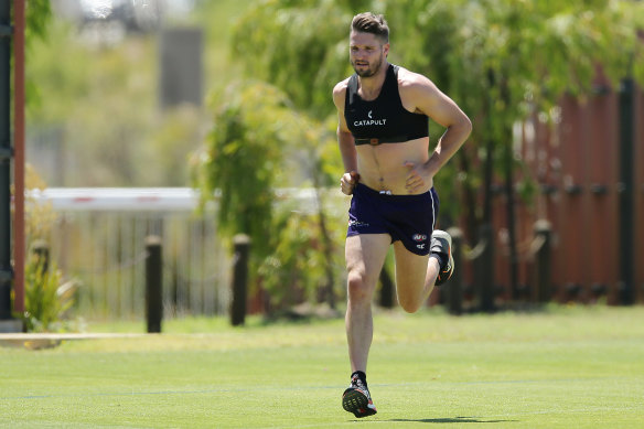 Jesse Hogan hits the track at Fremantle training earlier this year.