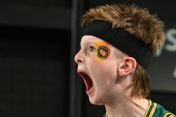 A young Jackjumpers fan screams for his team at Hobart’s MyState Bank Arena.