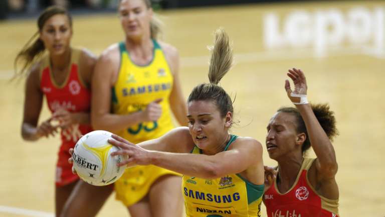 High stakes: Kim Ravallion receives possession for the Diamonds.