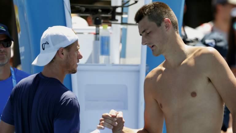 Hewitt and Tomic during the 2016 Australian Open. 
