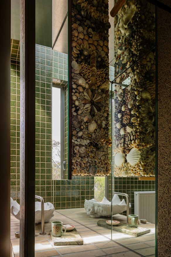 What started out as a “floating” mirrored cabinet in the ensuite of the main bedroom is elevated into a sublime art form.