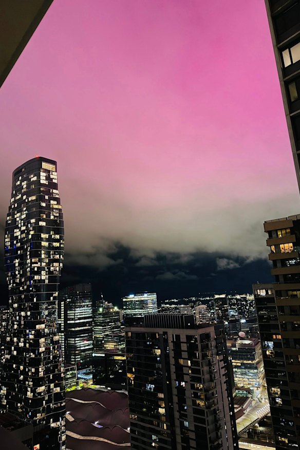 The pink glow from the Docklands apartment tower.