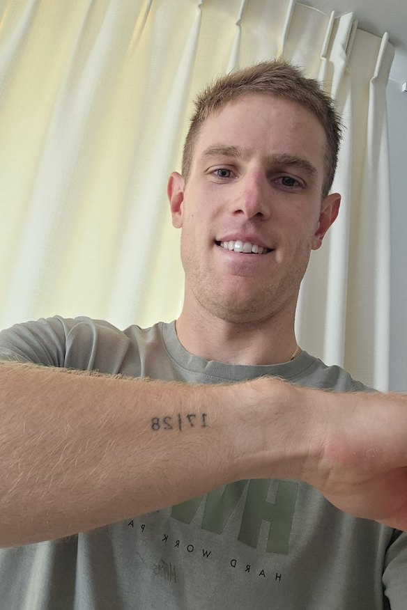 Wearn with a commemorative tattoo of his finishing positions in his first two races before his comeback win.
