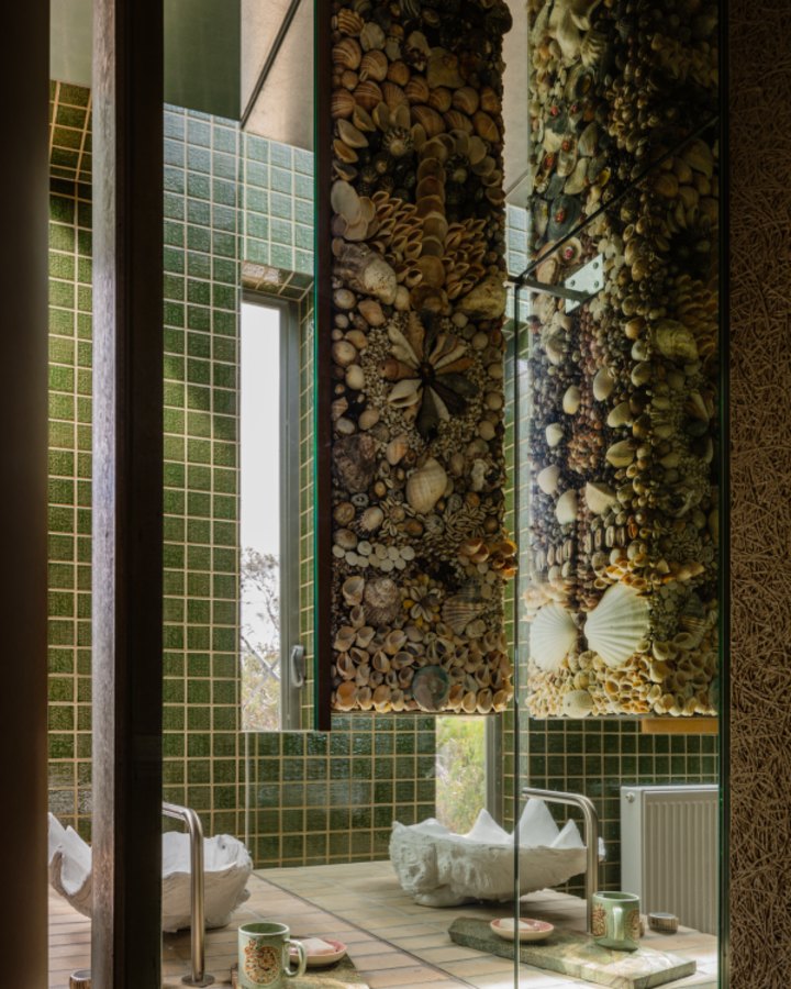What started out as a “floating” mirrored cabinet in the ensuite of the main bedroom is elevated into a sublime art form.
