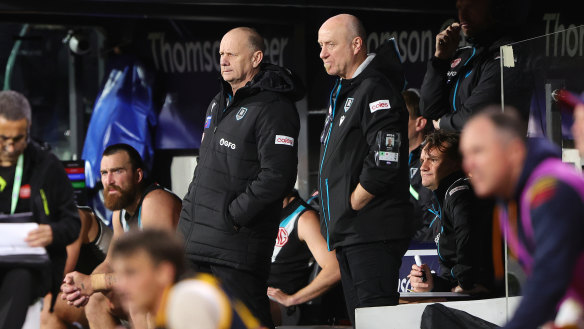 ADELAIDE, AUSTRALIA - MAY 02: Ken Hinkley, Senior Coach of the Power coaching from the bench during the 2024 AFL Round 08 match between the Adelaide Crows and the Port Adelaide Power at Adelaide Oval on May 02, 2024 in Adelaide, Australia. (Photo by Sarah Reed/AFL Photos via Getty Images)