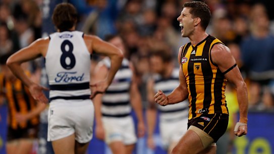 Luke Breust celebrates a key goal against the Cats on Easter Monday.