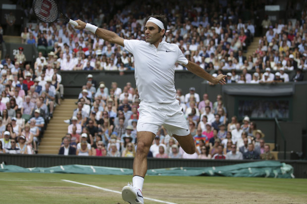 Roger Federer with a backhand return against Marin Cilic in the 2017 Wimbledon final.