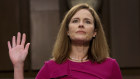 Supreme Court nominee Amy Coney Barrett is sworn in during a confirmation hearing before the Senate Judiciary Committee.