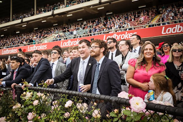 Punters cheer on a winner.
