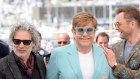 Elton John at Cannes with Rocketman director Dexter Fletcher and Taron Egerton, who plays him in the film.
