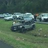 Debris strewn across Bruce Highway after crash closes all lanes and causes traffic 'gridlock'