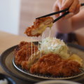 Katsu katsu is an onomatopoeic phrase used to describe the sound of crunchy food. You’ll hear that crunch a lot here.