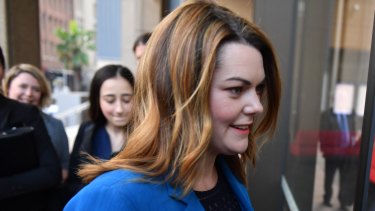 Greens Senator Sarah Hanson-Young arrives at court with her legal team.