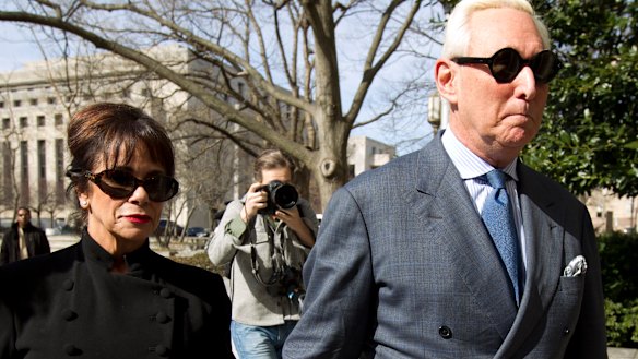 Roger Stone accompanied by his wife Nydia Stone, left, arrives at federal court in Washington.