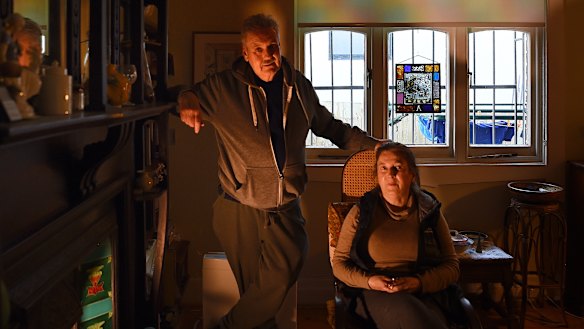 Sean Ferns (left) and Rose Gates (right) inside their home.