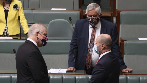 Wyatt, centre, with Scott Morrison and Josh Frydenberg in August 2021.