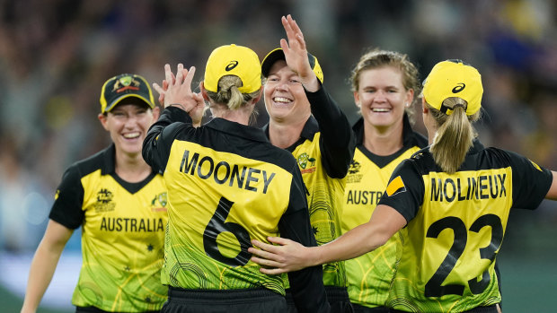 The Australian women’s cricket team on their way to winning the T20 World Cup.