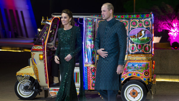 Prince William and Kate arrive in a traditionally-painted rickshaw.