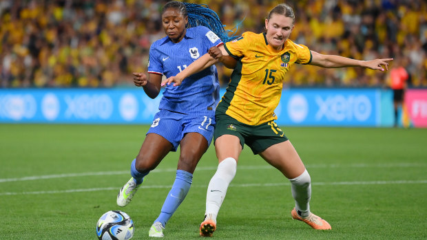 Australia’s Clare Hunt battles France’s Kadidiatou Diani for possession.