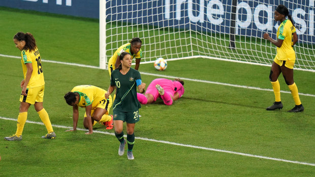 One of a kind: A pumped-up Sam Kerr celebrates the third of her four  goals against Jamaica.