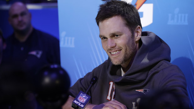 Old head on old shoulders: Tom Brady says he is sharing his experience of eight previous Super Bowls with the younger members of the squad.