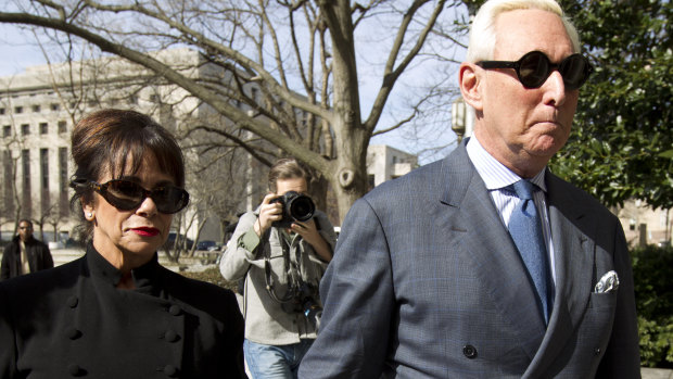Roger Stone accompanied by his wife Nydia Stone, left, arrives at federal court in Washington.