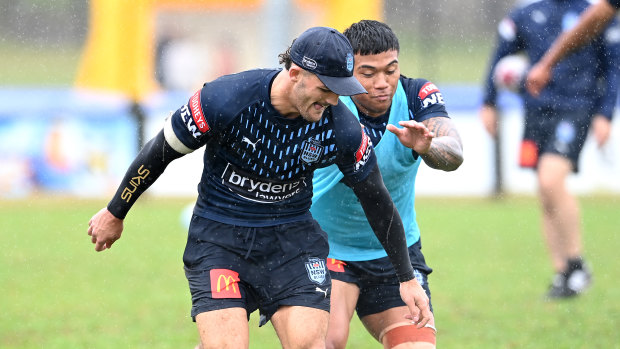 Nathan Cleary and Brian To’o compete for the ball at Blues training.