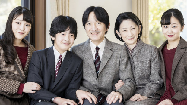 Japan’s Crown Prince Akishino, centre, with his wife Crown Princess Kiko, second right, and their children Princess Mako, left, Princess Kako and Prince Hisahito at their residence in Tokyo last year.