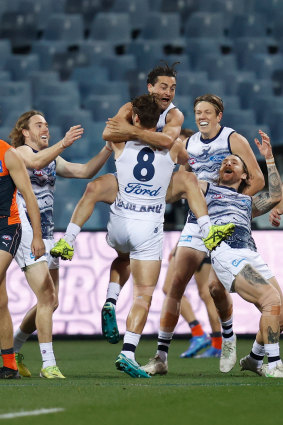 Jake Kolodjashnij celebrates after kicking a goal.