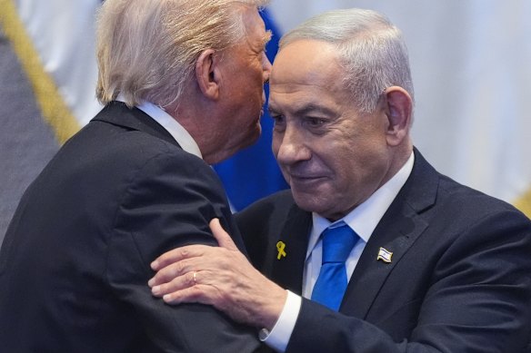 President Donald Trump talks with Israel’s Prime Minister Benjamin Netanyahu at the Knesset.