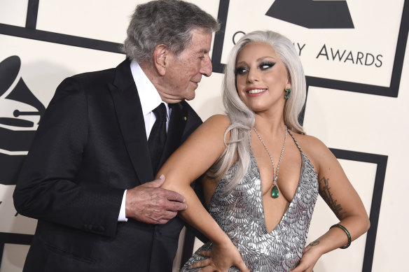 Tony Bennett, left, and Lady Gaga appear at the 57th annual Grammy Awards in Los Angeles in 2015.