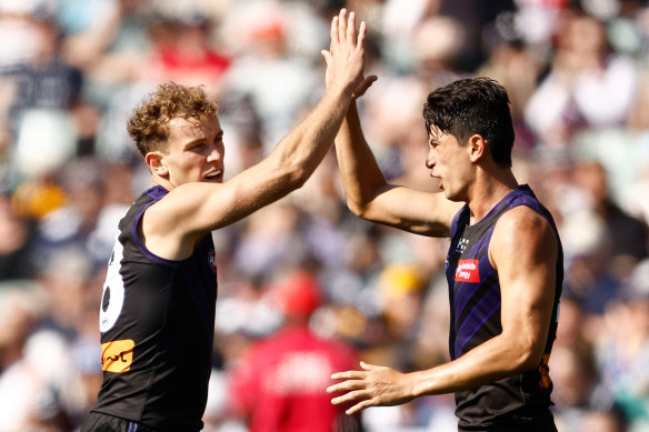 Tom Emmett (left) and Bailey Banfield of the Dockers celebrate.