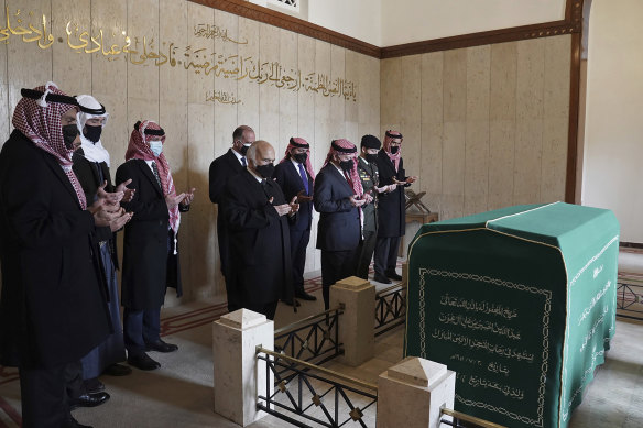 This photo from the Royal Court twitter account, shows Jordan’s King Abdullah II, third right, Prince Hassan bin Talal, fifth right, Prince Hamzah bin Al Hussein, seventh right, and others pray during a visit to the tomb of the late King Abdullah I, in Amman Jordan, Sunday, April 11, 2021. King Abdullah II and his half brother Prince Hamzah have made their first joint public appearance since a palace feud last week. Members of the Jordanian royal family Sunday marked the centenary of the establishment of the Emirate of Transjordan, a British protectorate that preceded the kingdom. 