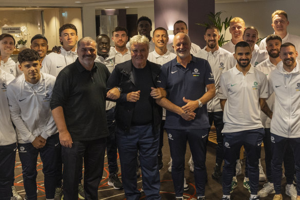 Big three ... Ange Postecoglou, Guus Hiddink and Graham Arnold with the Socceroos squad in London.