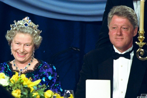 Queen Elizabeth sits alongside President Bill Clinton at a dinner in the Guildhall in Portsmouth, England, commemorating the 50th anniversary of D-Day.