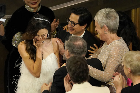 Michelle Yeoh reacts as she is declared winner of the best actress Oscar for Everything Everywhere All At Once.