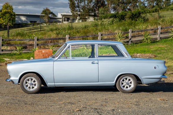 A metallic blue 1965 Mk I Cortina, very similar to the one the writer used to own.