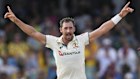 Australia's Mitchell Starc celebrates taking the wicket of West Indies' John Campbell , right, during day one of the first cricket Test match at Kensington Stadium in Bridgetown, Barbados, Wednesday, June 25, 2025. (AP Photo/Ricardo Mazalan)